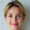 Photo of Jessica M., a calm woman in her early 40s, looking balanced and content.
